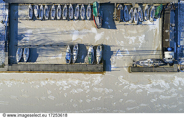 Nederland  Broek  Overhead view of sailboats moored at marina in frozen water