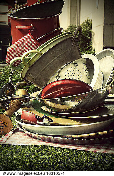 Netherlands  Amsterdam  stack of old cooking utensils used for advertising