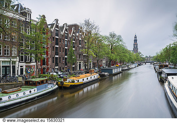 Netherlands  Amsterdam  Various boats moored along city canal
