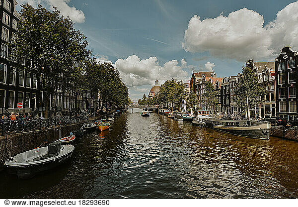 Netherlands  North Holland  Amsterdam  City canal with rows of moored boats on each side