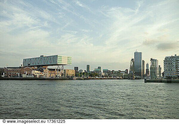 Netherlands  South Holland  Rotterdam  Nieuwe Maas river with city buildings in background