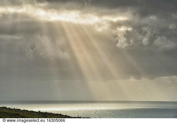 New Zealand  Chatham Island  Sun breaking through clouds