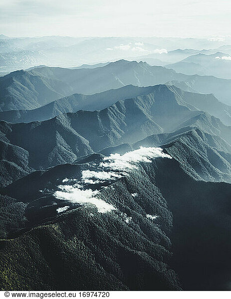 New Zealand South Island mountains seen out window of a small plane