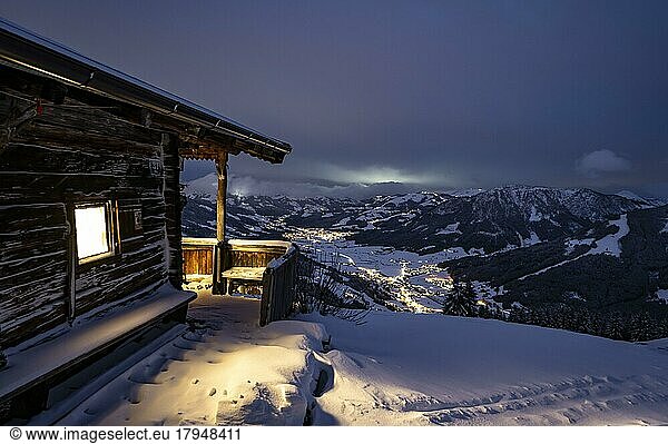 Night shot  mountain hut in the snow  view into the valley  at the skiing area Bixen im Thale  Tyrol  Austria  Europe