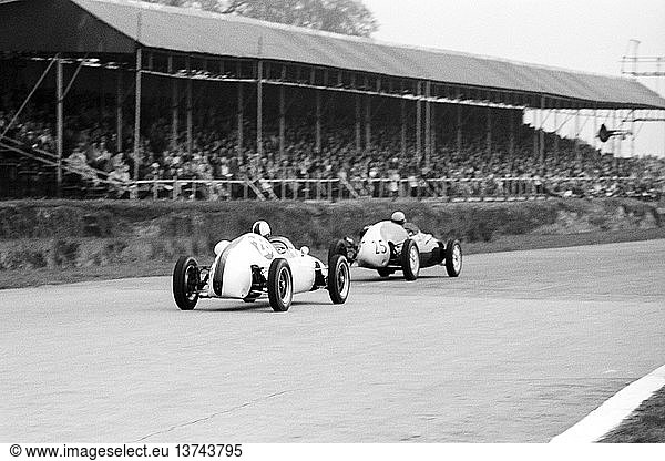 No 28 Mike Spence and No 25 Edward Hine  both Cooper T52 Formula Junior cars in XXXIX BARC race. Members Meeting  Goodwood  England 19 March 1960.