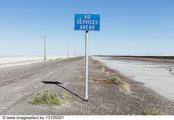 No Services Ahead sign along remote desert road