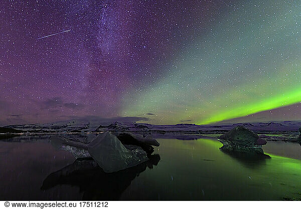 Northern lights over glacier lagoon  Iceland