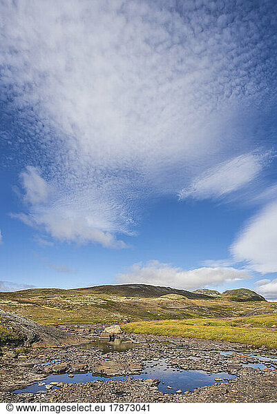 Norway  Clouds over stream in Hardangervidda National Park