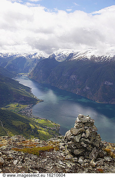 Norway  Fjord Norway  Aurlandsfjord  heap of stones in foreground