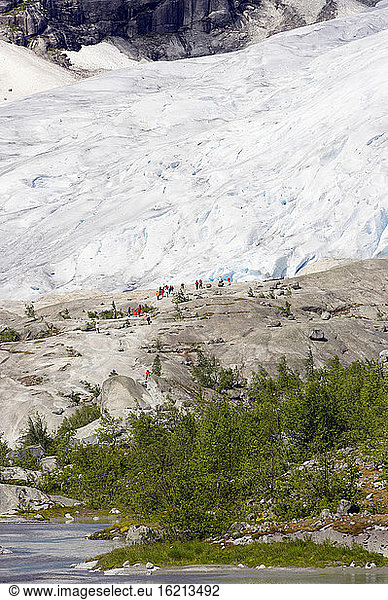 Norway  Nigardsbreen  Tourists on glacier tongue