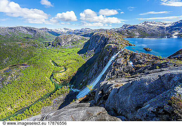 Norway  Nordland  Scenic view of lake Litlverivatnet and Litlverivassfossen waterfall