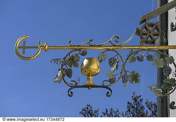 Nose sign with gilded wine jug of a wine tavern  blue sky  Bamberg  Upper Franconia  Bavaria  Germany  Europe