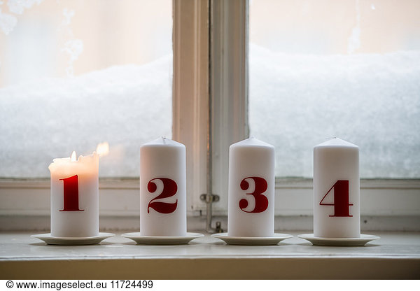 Numbered candles  one burning