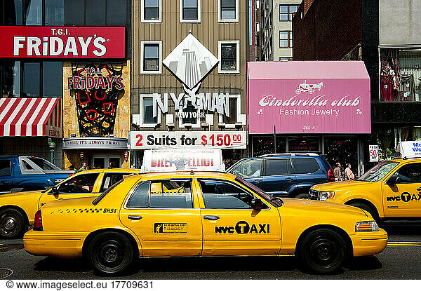 Ny Taxis In A Commercial Area In Manhattan  New York  Usa