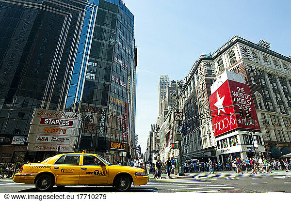 Ny Taxis Passing By Macy's  The Biggest Department Store In The World  Manhattan  New York  Usa