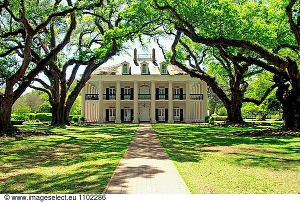 Oak Alley Plantation home with live oaks trees in rural Louisianna  USA