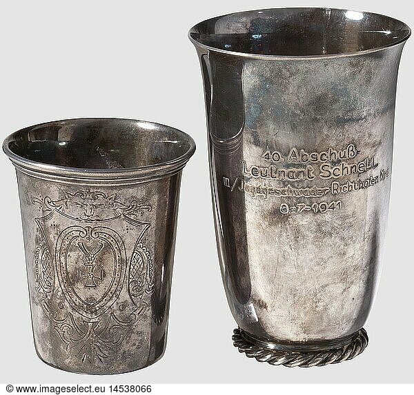 Oak Leaves Winner Hauptmann Siegfried 'Wumm' Schnell  Three silver gift beakers on his award of the Oak Leaves The first with obverse engraving of a Knight's Cross with Oak Leaves within a shield surrounded by floral décor  the reverse with 'Zum 40. Luftsieg - die 4.Staffel' below a squadron coat of arms. Dutch mark of fineness 934/1000  height 85 mm. The second obverse is engraved '40. Abschuß - Leutnant Schnell - III./Jagdgeschwader Richthofen Nr. 2 - 8-7-1941'. Fineness punch '835'  height 12.5 cm. The third with obverse engraving of a Luftwaffe eagle above squadron insignia and circumscription 'Jagdgeschwader Richthofen - Leutnant Schnell zum 644. Abschuss des Geschwader Richthofen Nr. 2 - 8.7.1941'. Fineness mark '800'  height 12 cm. Included is a silver beaker engraved 'Erg. Jagdgr. Ost historic  historical  1930s  20th century  Air Force  branch of service  branches of service  armed service  armed services  military  militaria  air forces  object  objects  stills  clipping  clippings  cut out  cut-out  cut-outs