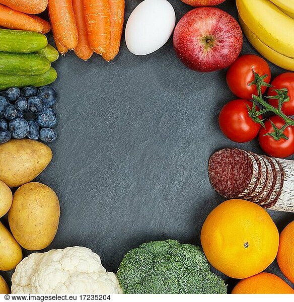Obst und Gemüse Lebensmittel Früchte Rahmen Schieferplatte Textfreiraum von oben Aufsicht