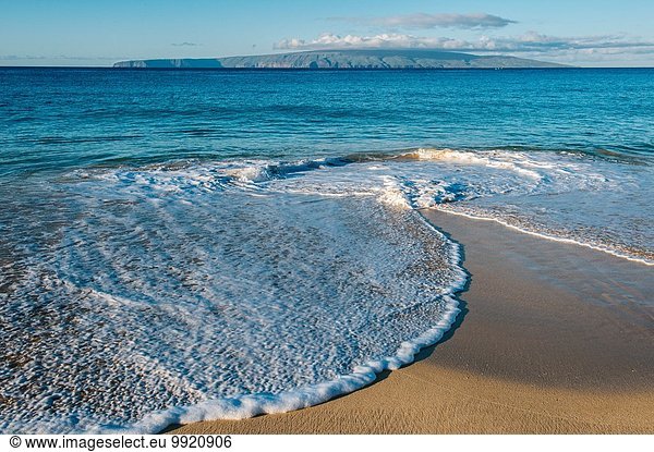 Ocean tides on beach  Maui  Hawaii