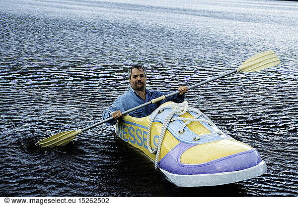 oddities  leisure time  Hobbies  sports  boat in shoe form  Georg Wessels  Vreden  driving with his shoe boat on lake  October 1990