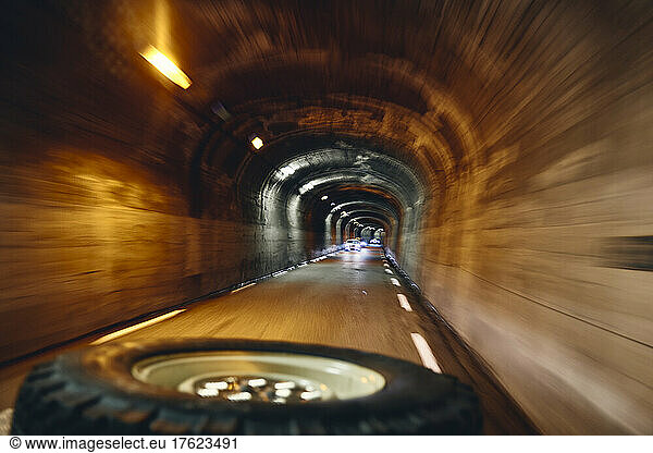 Off-road vehicle in illuminated tunnel  Col d'Izoard  Arvieux  France