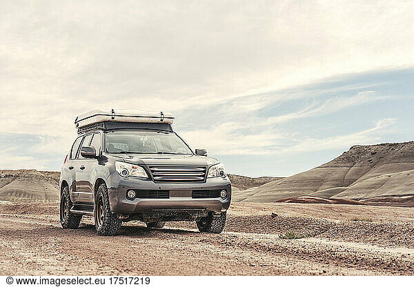 Offroad vehicle in desert landscape