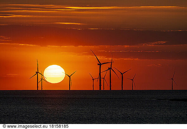 Offshore wind farm with amazing sunset  New Brighton  Cheshire  England  United Kingdom  Europe