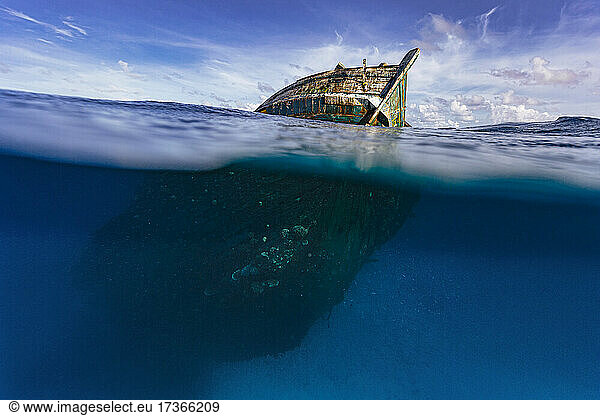 Old abandoned ship in sea