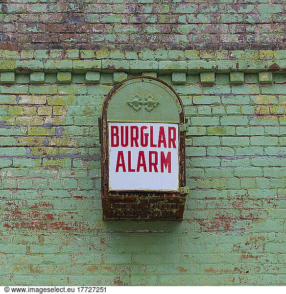 Old burglar alarm ona building facade