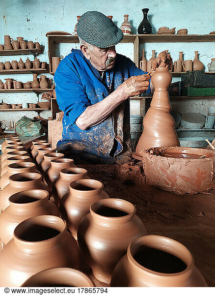 old man work the clay