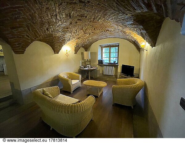 Old 17th century cross vault converted into lounge  Agriturismo Le 5 Frecce  Cavour  Piedmont  Italy  Europe