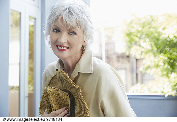 Older Caucasian woman smiling outdoors