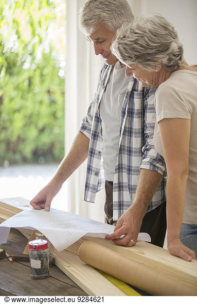 Older couple looking through documents together