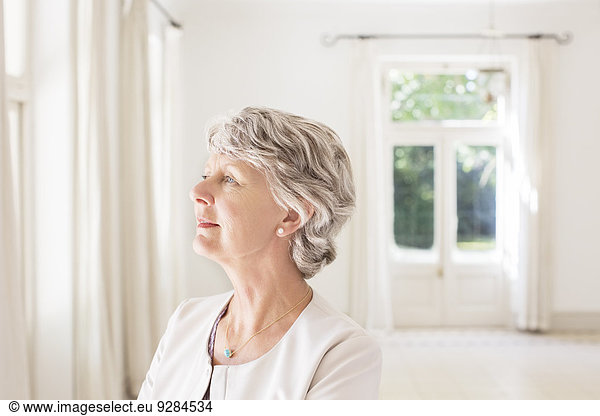 Older woman overlooking living space