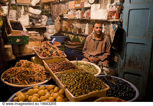 Olive seller in the market at the medina (old town). Essaouira  Morocco.
