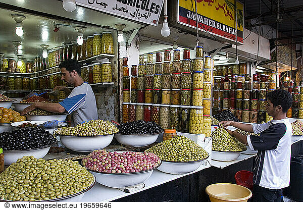 Olive seller in the market at the medina (old town). Marrakesh  Morocco.