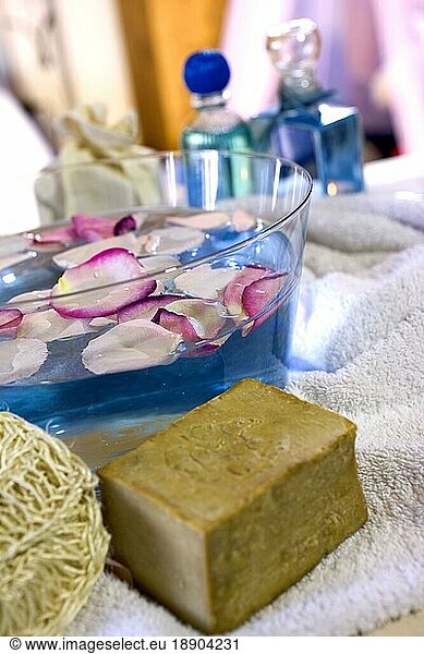 Olive soap  petals  perfume bottles  sisal sponge  bath