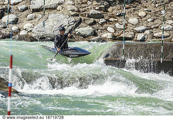 Olympic hopeful kayaker trains at the Rutherford Whitewater Park.