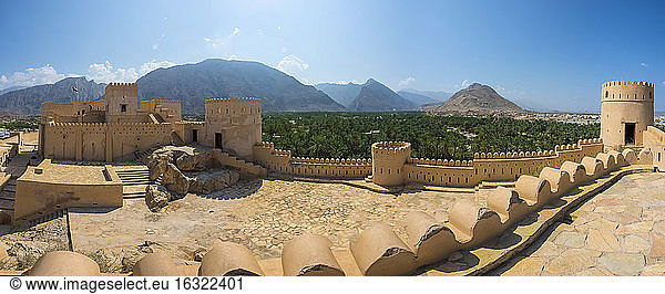 Oman  Al Batinah Region  Al Hajar Mountains  Nakhal  Panoramic view  Fort Nakhal  oasis Nakhal and Jebel Nakhl massif