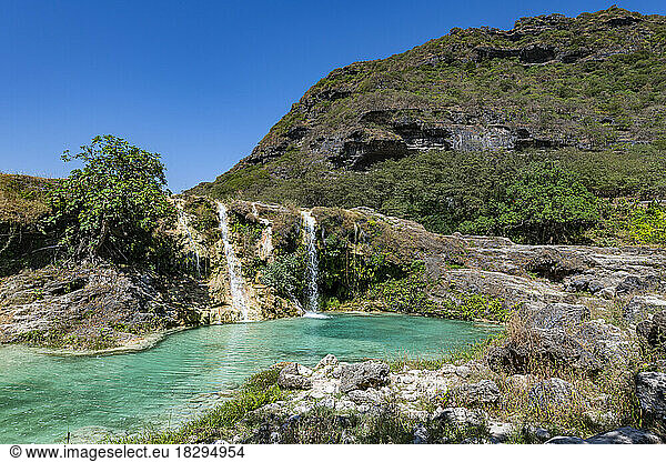 Oman  Dhofar  Salalah  Turquoise pond and waterfalls of Wadi Darbat river