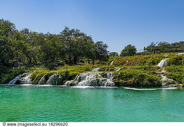 Oman  Dhofar  Salalah  Turquoise pond and waterfalls of Wadi Darbat river