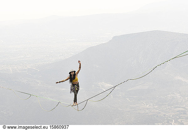 One girl walks in a Highline at Los Frailes  Hidalgo  Mexico