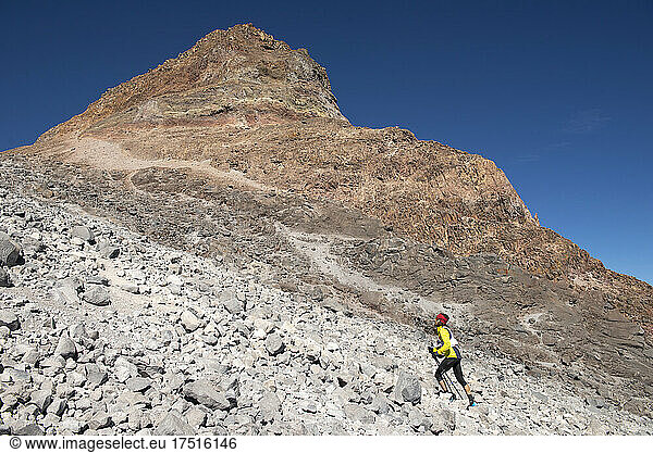 One man hikes up through rocky terrain near Pico de Orizaba glacier