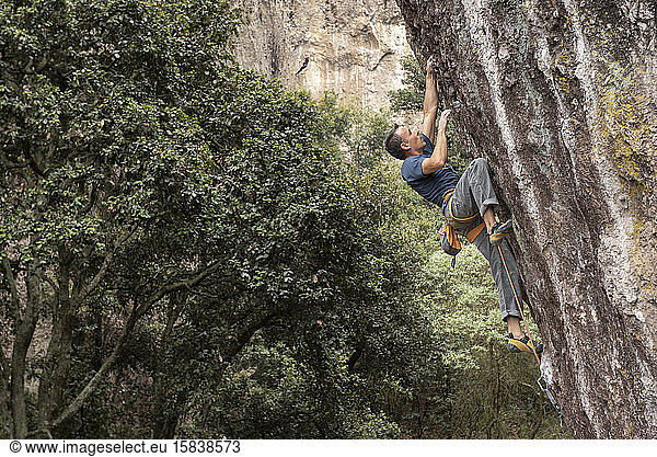 One man rock climbing in Jilotepec  Mexico