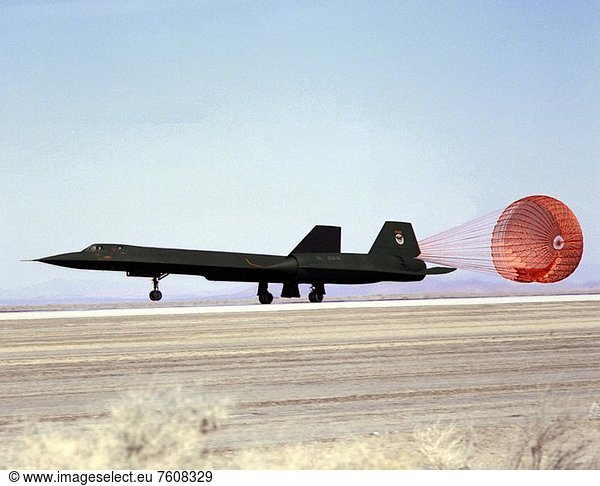 One of two initial U.S. Air Force SR_71A reconnaissance aircraft that was retired from operational service and loaned to NASA for high_speed research programs arrives at NASA´s Dryden Flight Research Center  Edwards  California. The aircraft deployed its drag chute even before its nose gear touches the runway at the end of a 1990 research flight. Dryden flew three YF_12 aircraft  prototypes of the triple_sonic SR_71s  in an earlier supersonic research program between 1969 and 1979.