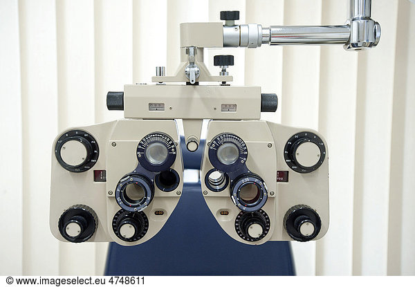 Optician's equipment to control eyes  preliminary examination of the eyes for the fitting of contact lenses