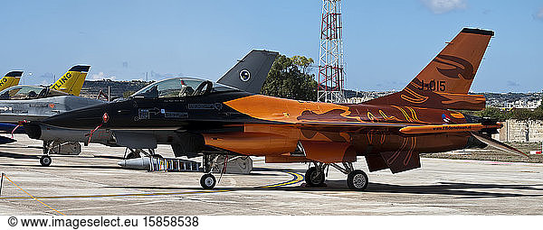 Orange fighter jet aircraft from Netherlands at Luqa airfield in Malta