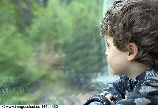 Orebro  Boy looking through window