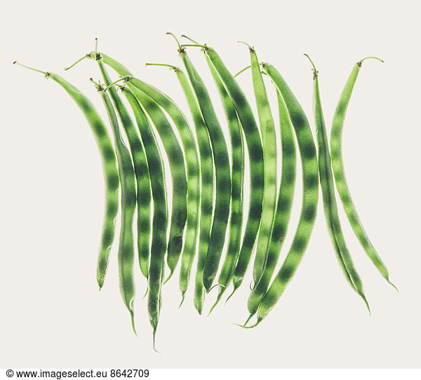 Organic green string beans on white background