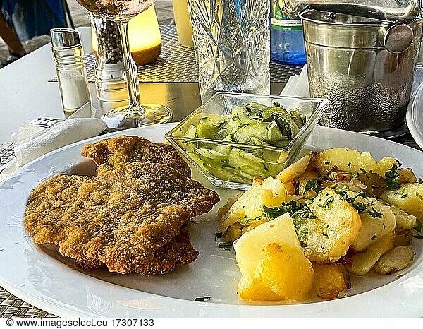 Original Viennese veal escalope with fried potatoes and cucumber salad  Port Andratx  Majorca  Spain  Europe